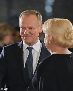 EU Council President Donald Tusk pictured left has hinted that Brexit should be cancelled