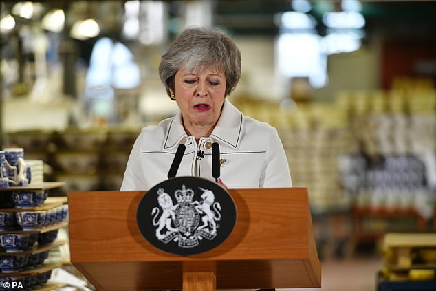 Theresa May pictured on delivering her speech in Stoke on Trent today