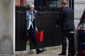 Theresa Mays pictured today leaving Downing Street senior ministers are deeply split over