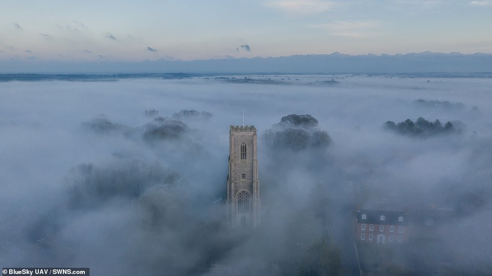 Fog around St James Parish Church in Southrepps