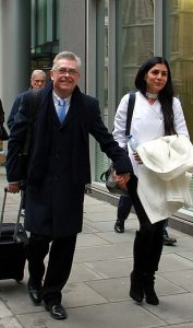 Former BA pilot Chris Burgess 65 and his wife Cleide arrive outside the High Court in London