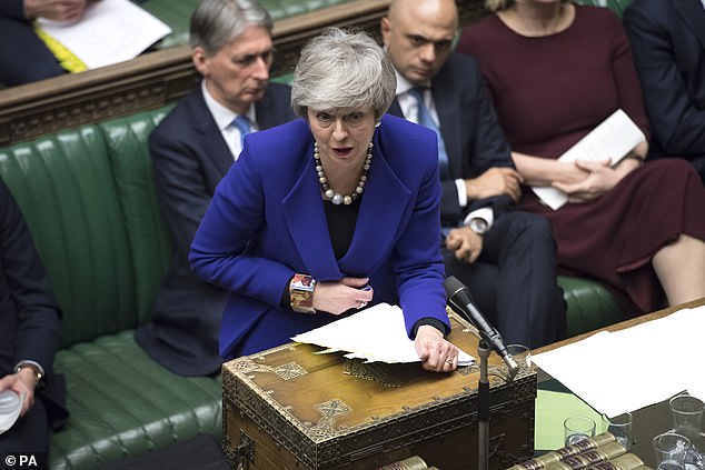 Theresa May pictured at PMQs on Wednesday has ordered officials to test the workability of a Plan C for Brexit hatched by a group of Leave and Remain Tories