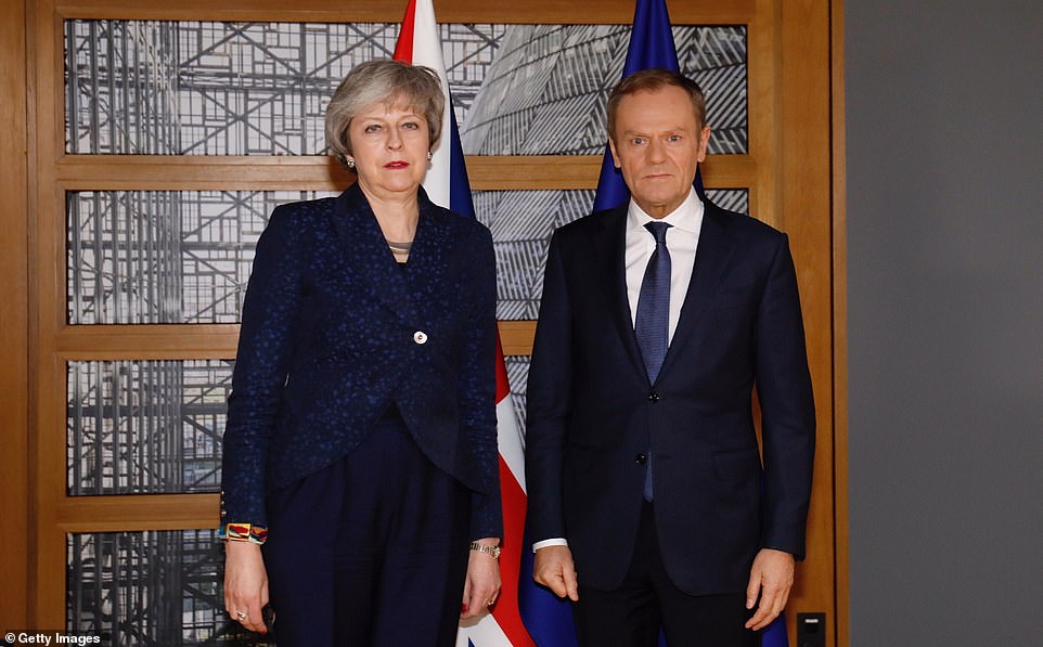 Theresa May said she confronted Donald Tusk pictured together in Brussels today