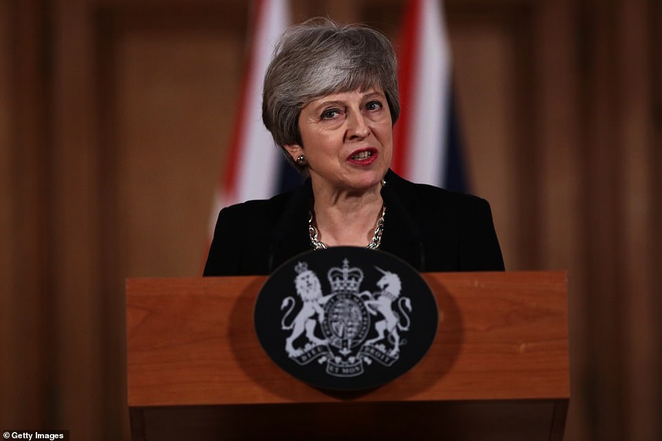 Theresa May pictured tonight in Downing Street admitted Brexit would