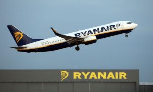 suspicious device on passenger plane found to be mobile phone